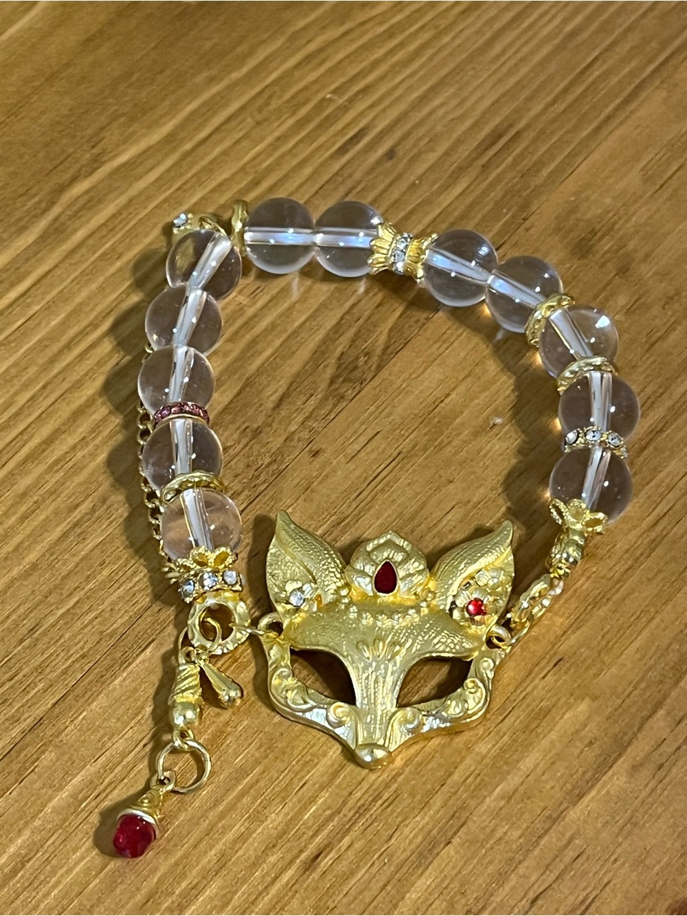 Spirit fox mask design stretch bracelet gold tone chain clear beads dangle charm